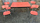 Table formica orange corail, 4 chaises formica assorties, vintage, années 60.